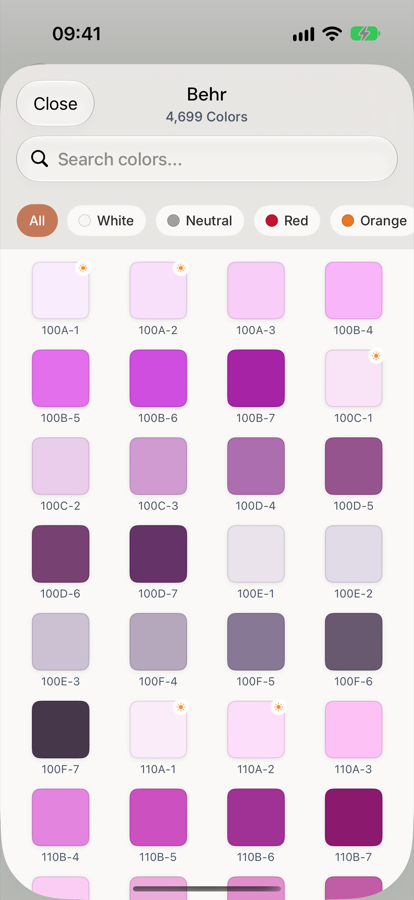 The Behr fandeck open in Muro, 4,699 colors, each swatch labelled with its catalogue code